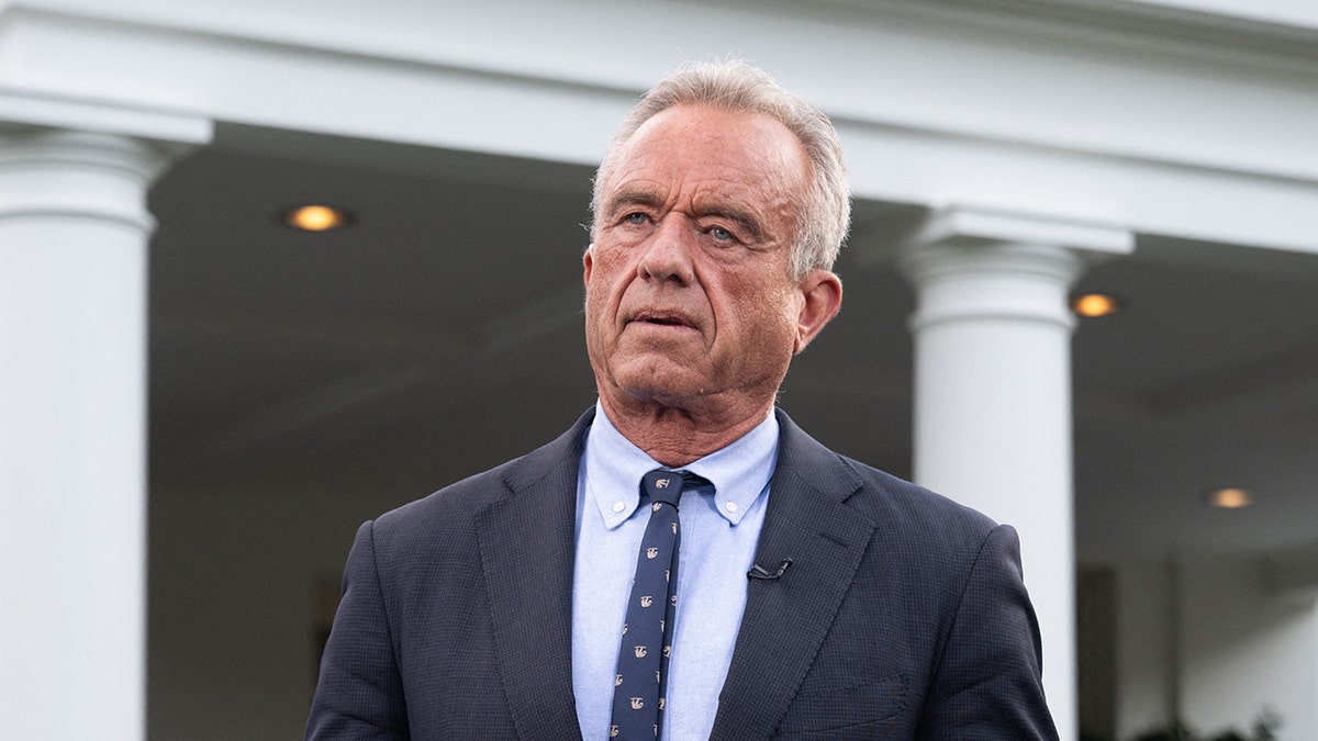 US Secretary of Health and Human Services Robert F. Kennedy Jr. prepares for a television interview outside of the West Wing of the White House