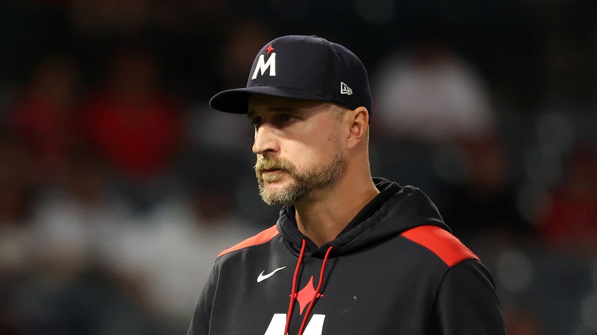 Rocco Baldelli looks on field