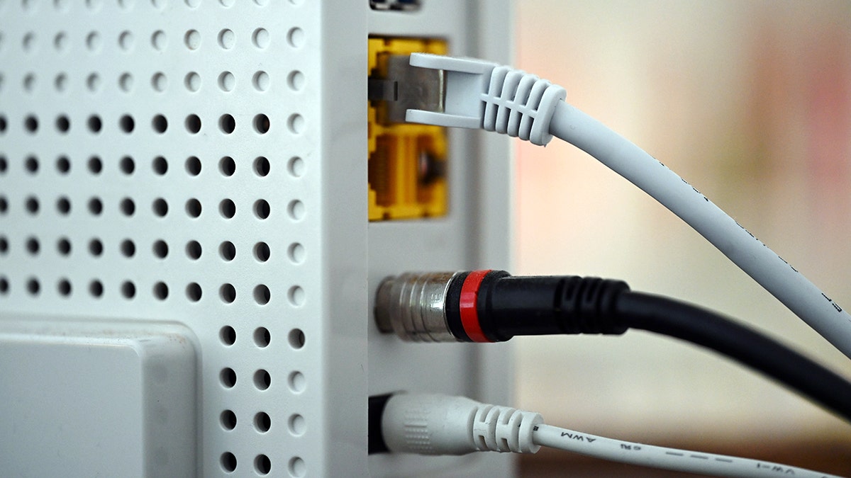 Wires connected to a router.