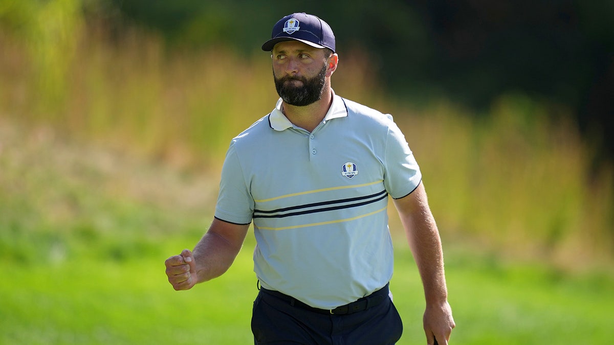 Jon Rahm celebrates