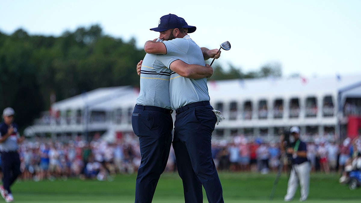 Jon Rahm and Sepp Straka celebrate