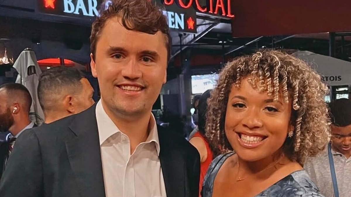 Charlie Kirk is left of a camera smile with the Savannah Craven, Pro-Life's Hife Hife, on the right.