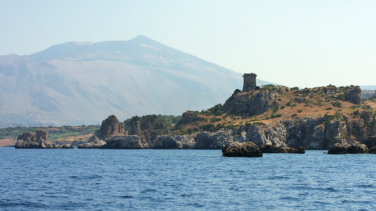 Aegates Island backdop on the water