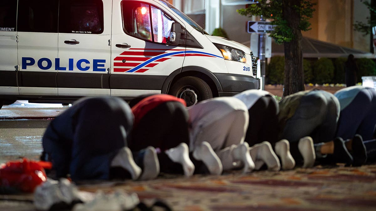 Muslim students pray at sunrise at a Gaza solidarity encampment at George Washington University