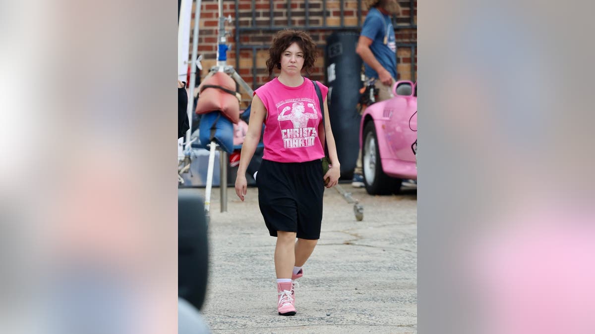 Sydney Sweeney in character on the set of "Christy." 