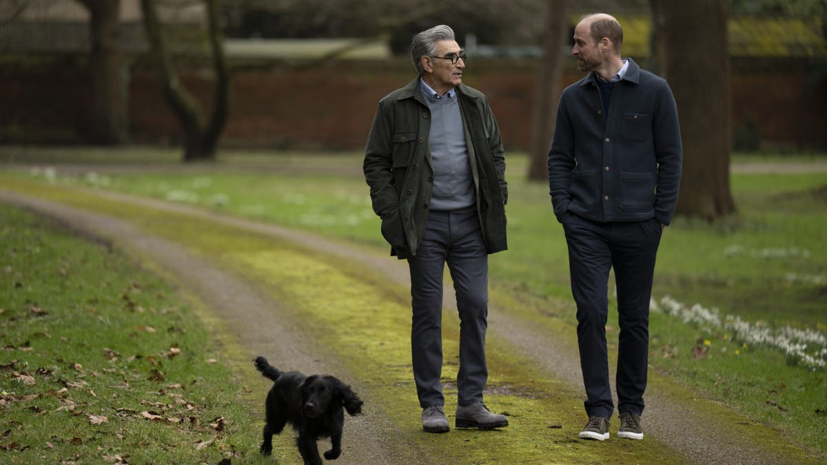 Eugene Levy and Prince William walking