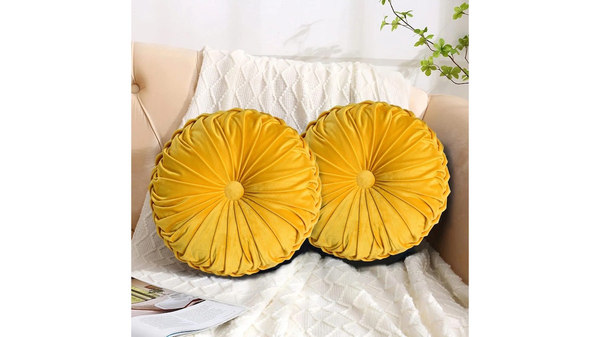 Add some fall color to your living space with these velvet pillows.