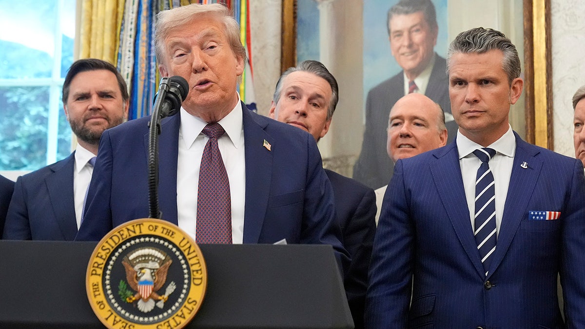 President Donald Trump speaks about the relocation of U.S. Space Command headquarters from Colorado to Alabama in the Oval Office of the White House, Tuesday, Sept. 2, 2025, in Washington, as Vice President JD Vance and Defense Secretary Pete Hegseth listen.