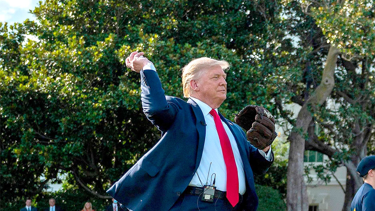 Trump throwing baseball