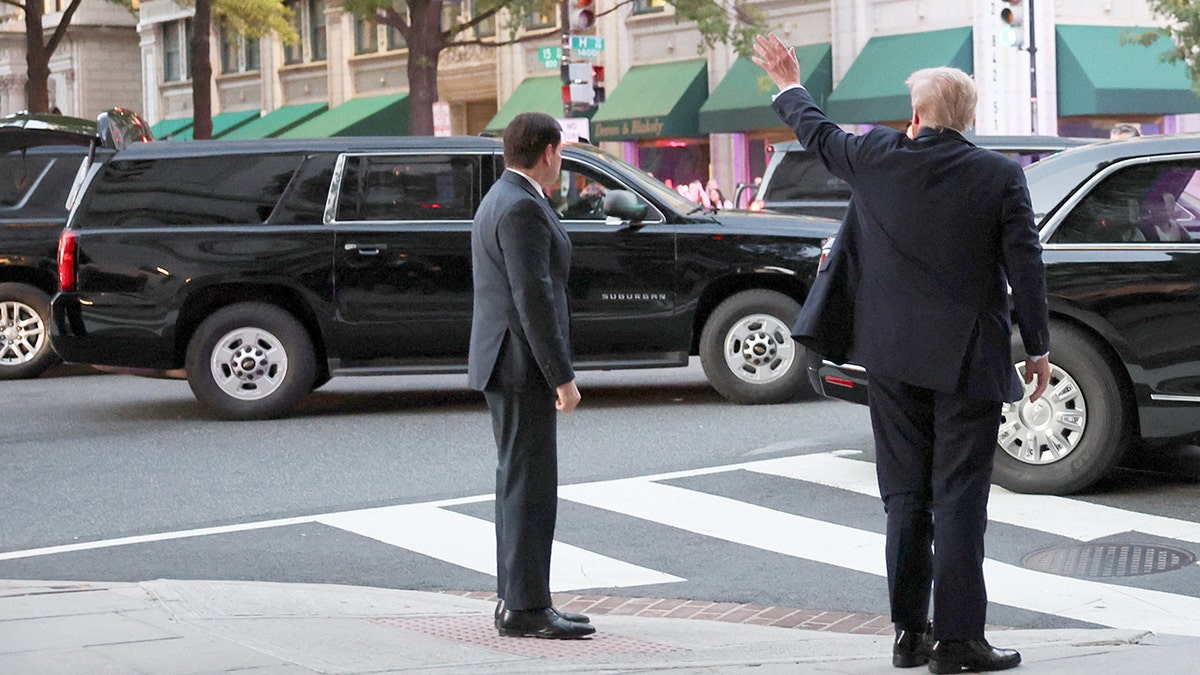 President Donald Trump waved outside Joe's seafood in DC on Tuesday night