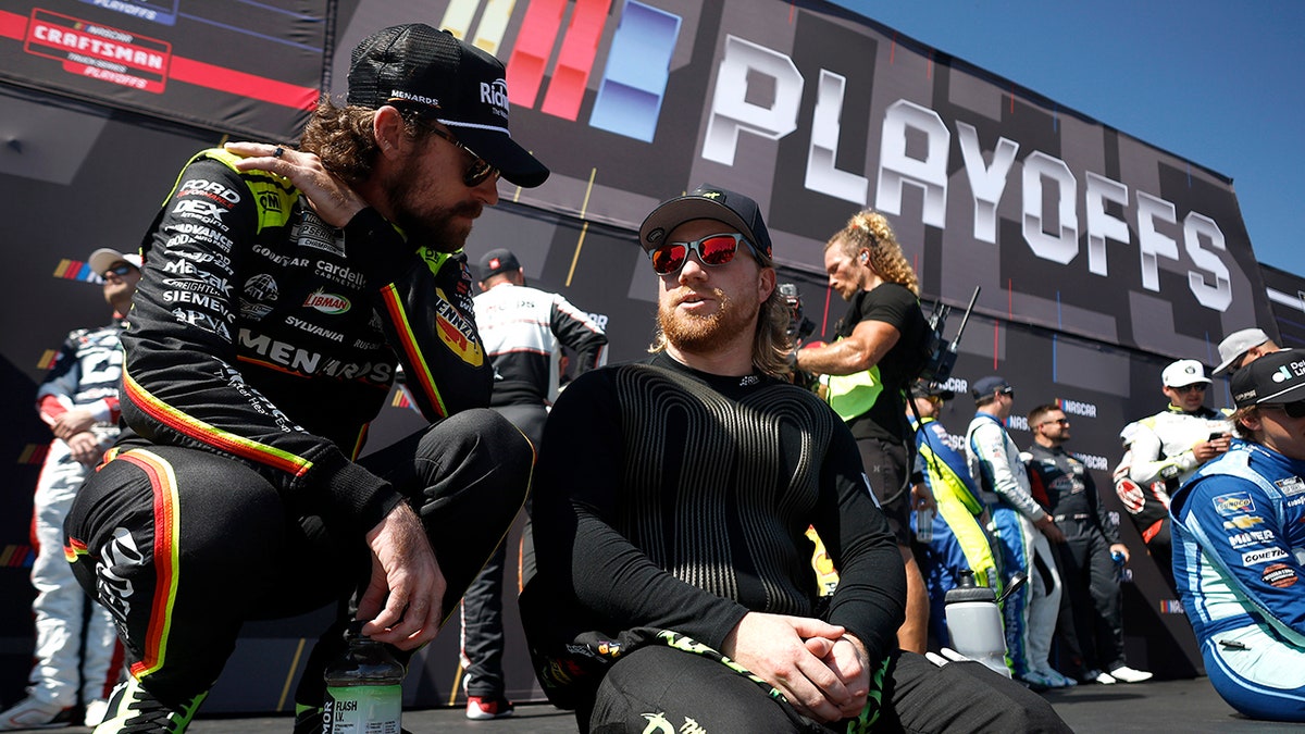 Tyler Reddick talks with Ryan Blaney