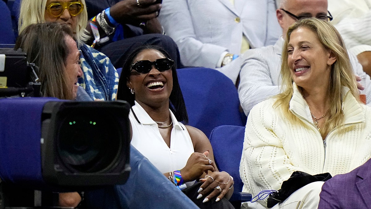 Simone Biles attends our opening