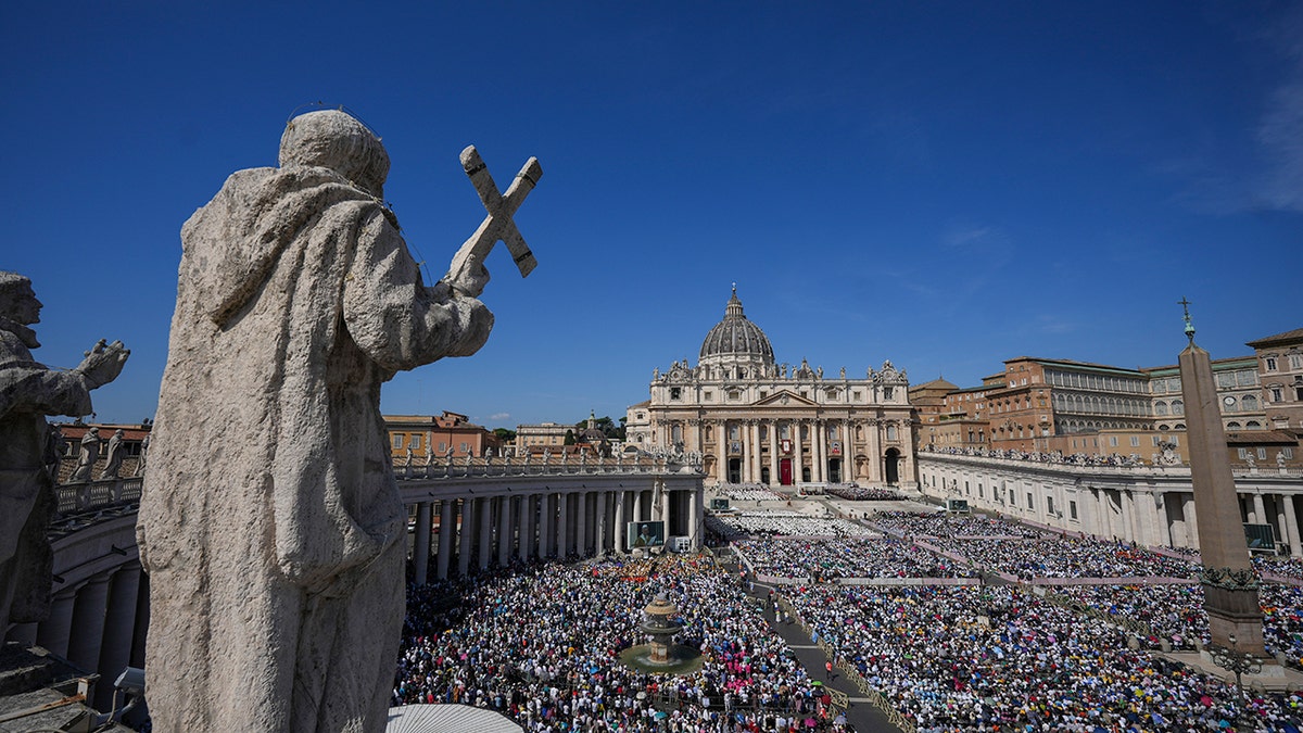 Crowds of people gathered in St. Peter's Square