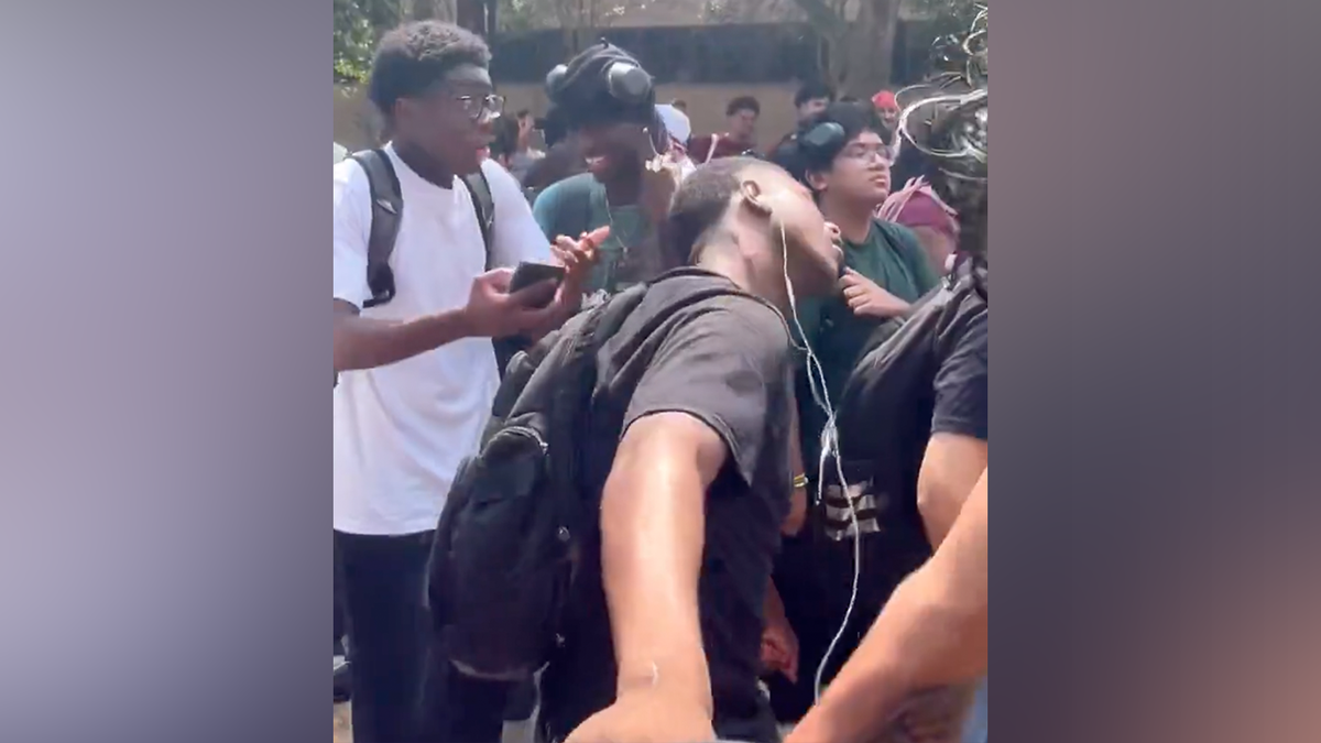 It is unclear if the unidentified man is a student at the university.