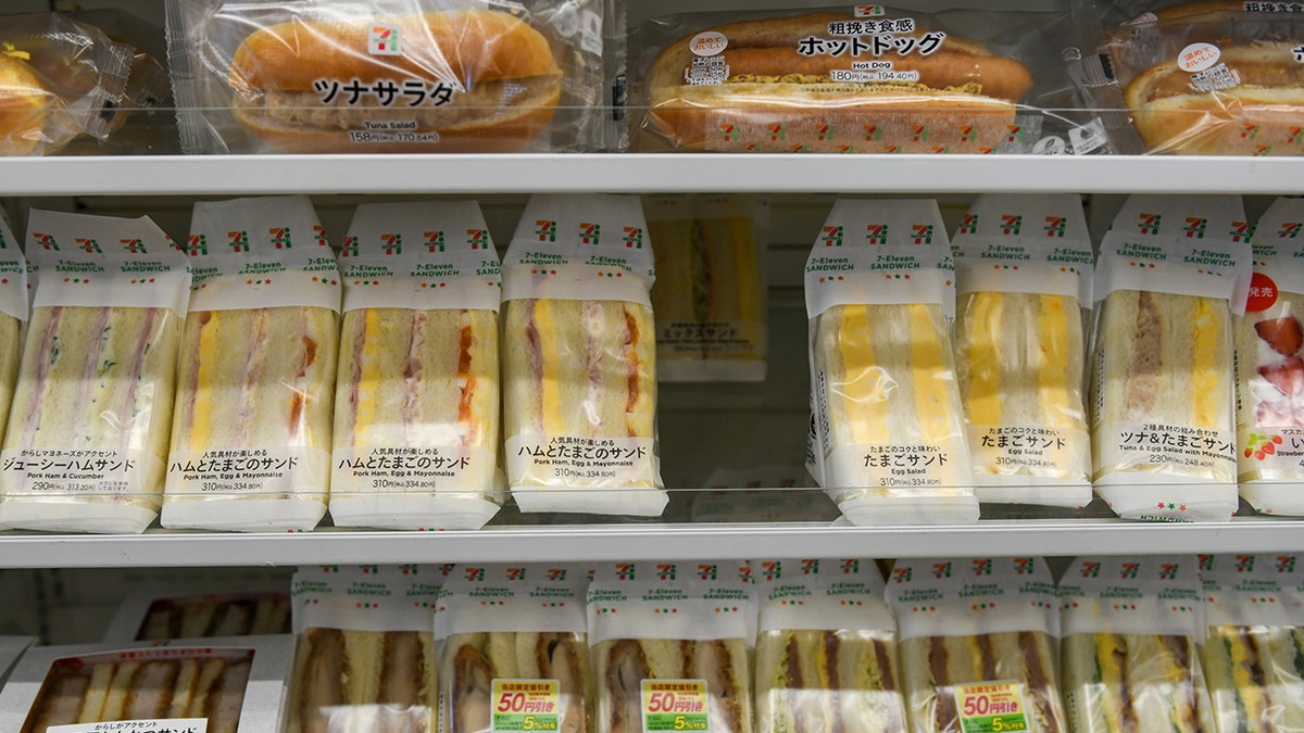 Packages of sandwiches including egg salad at a 7-Eleven convenience store, operated by Seven & i Holdings Co., in Tokyo, Japan, on Thursday, Jan. 18, 2024.