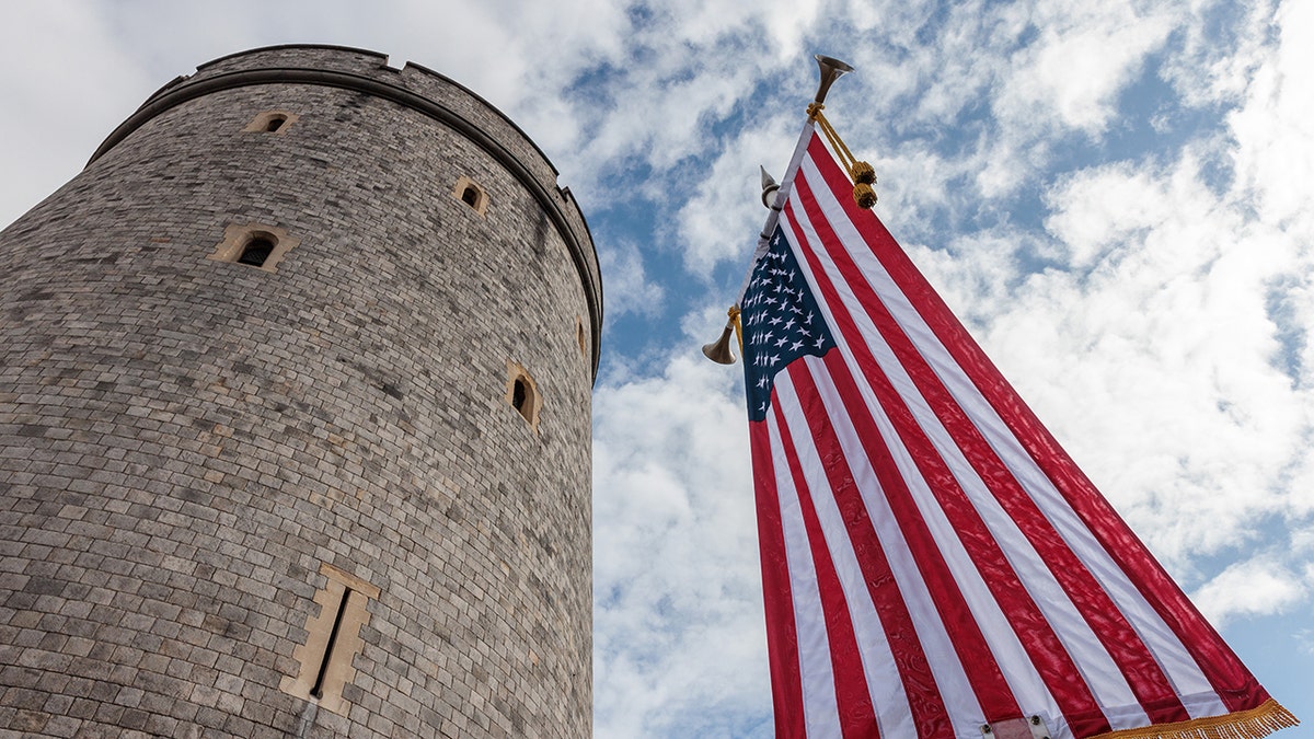 An aerial view of Windsor Castle with the American flag.