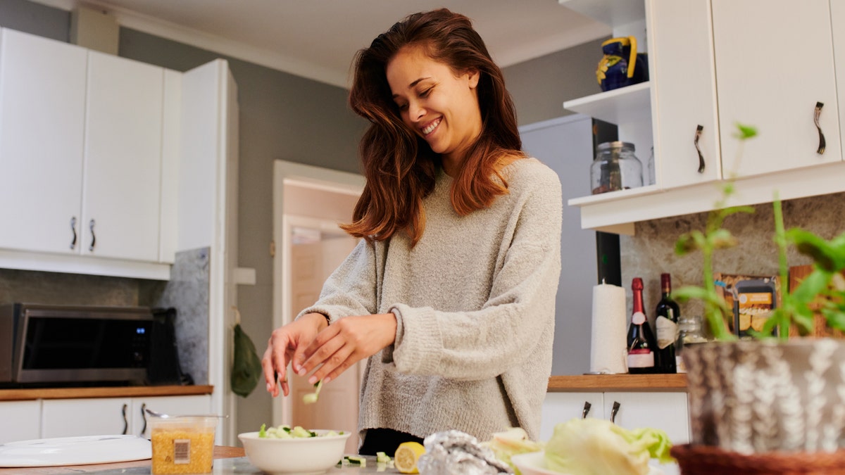 woman cooking at home