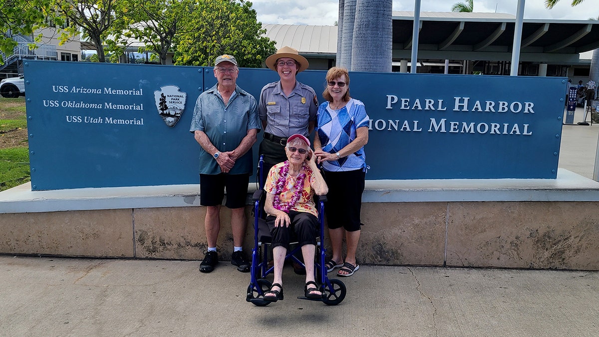 World War II Navy Nurse Alice Beck Darrow in front of national Pearl Harbor Museum
