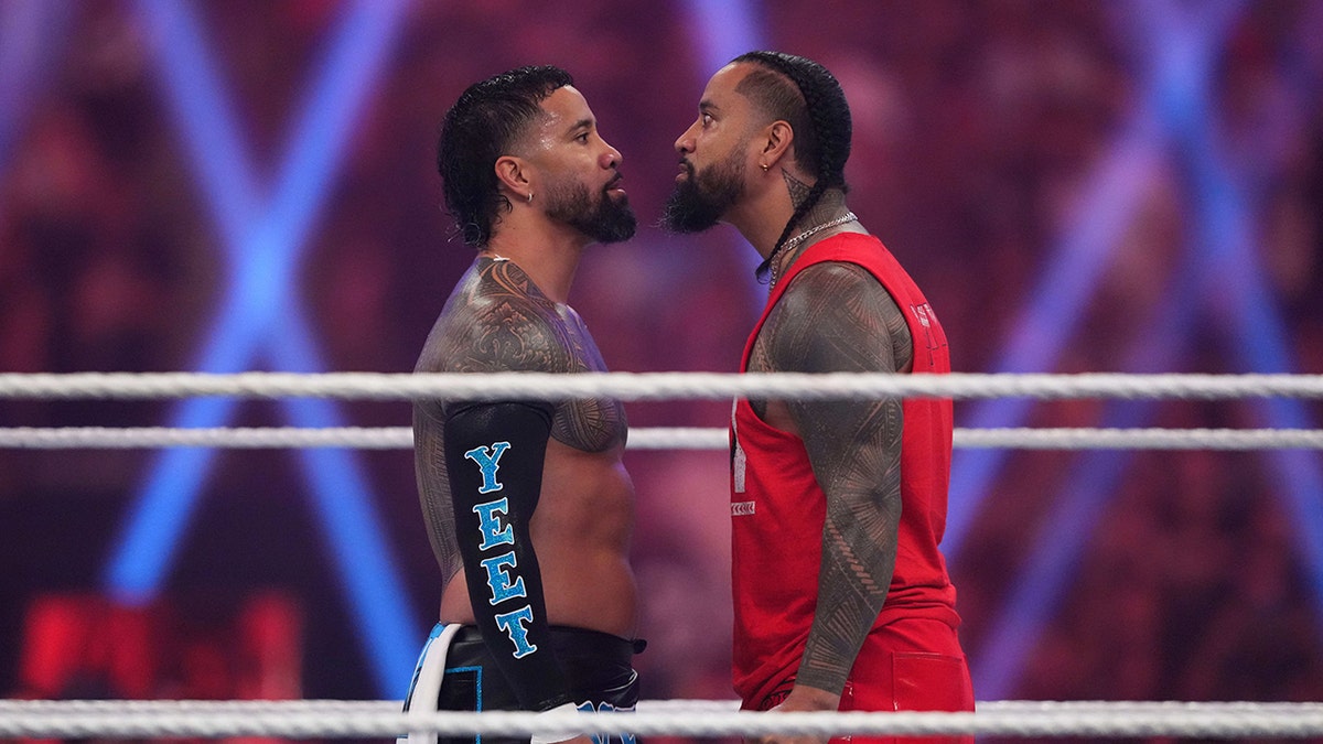 Jimmy Uso and Jey Uso faceoff