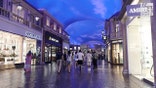 Customers shop at luxury mall inside of Caesars Palace casino hotel in Las Vegas.