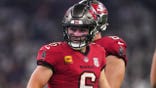 Baker Mayfield runs the ball