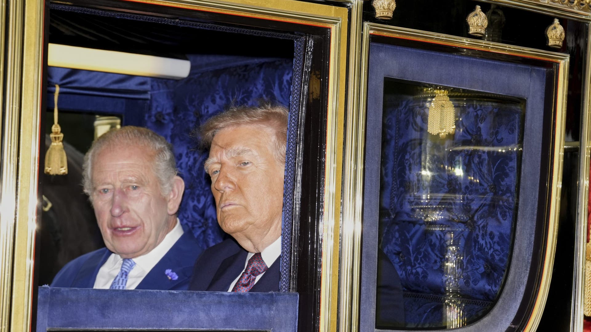 King Charles III and President Donald Trump ride in the carriage procession to Windsor Castle on September 17, 2025.