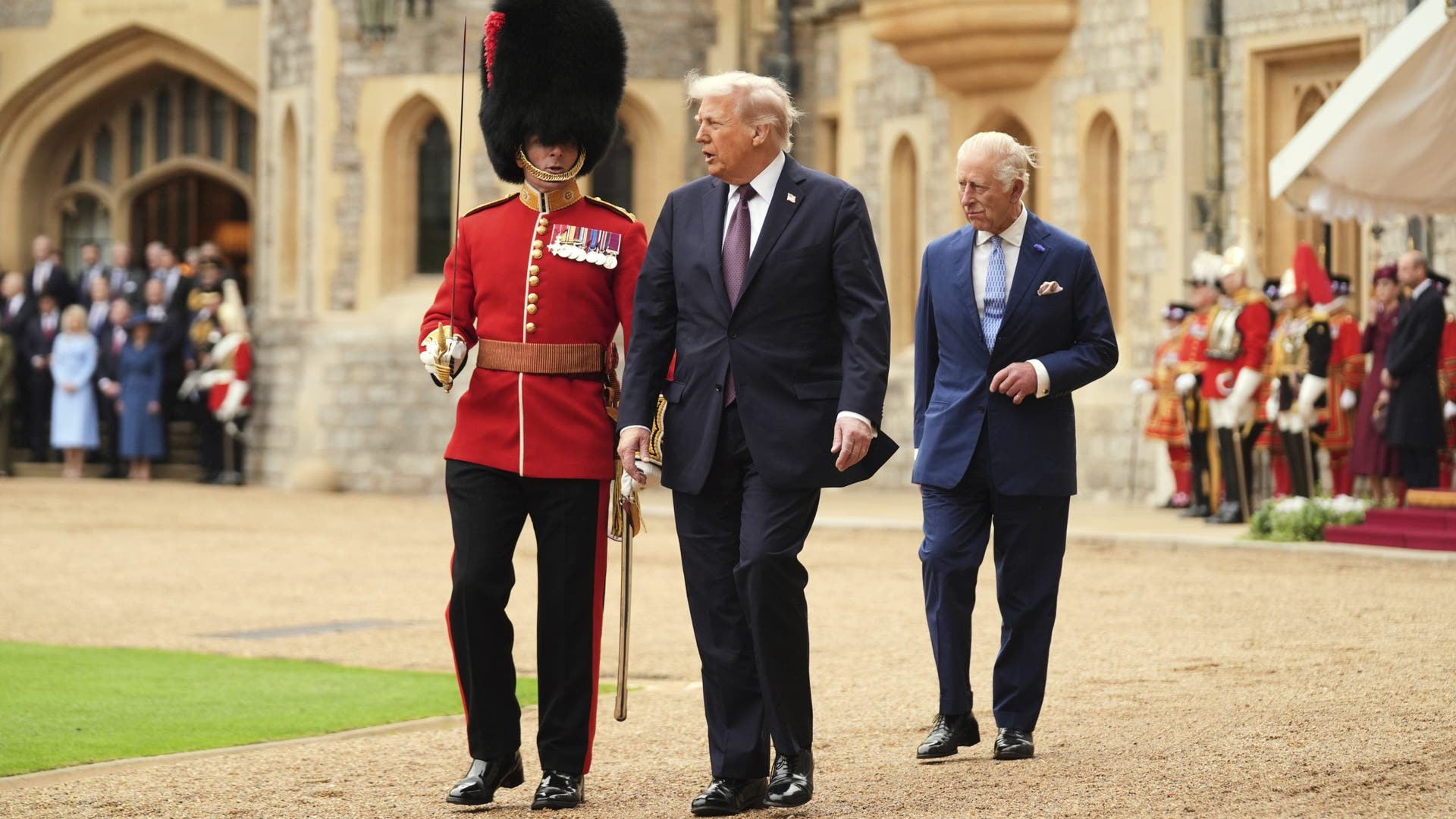 President Donald Trump and King Charles III prepare to inspect the guard of honor during an arrival ceremony at Windsor Castle on September 17, 2025.