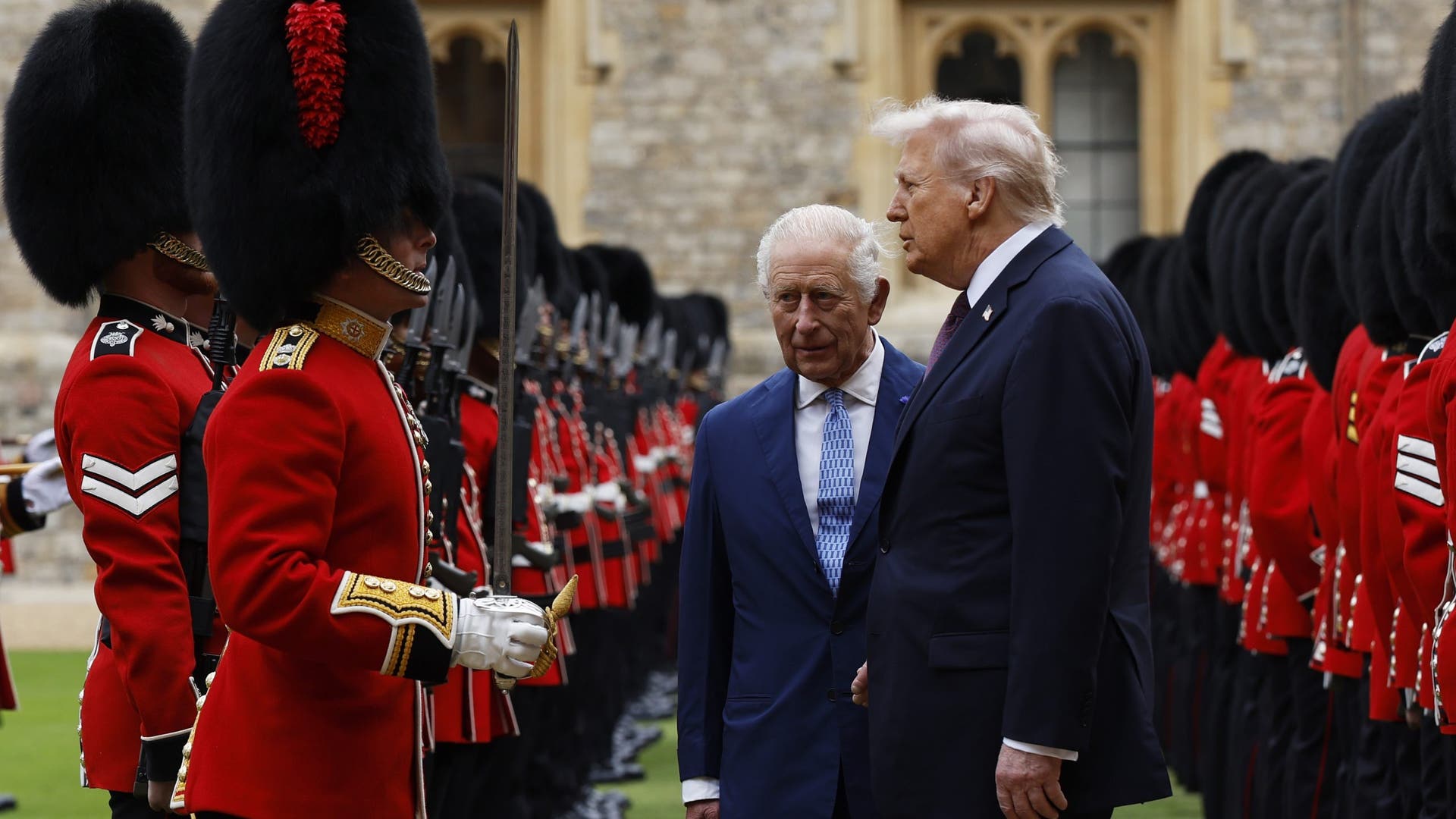 King Charles III and US President Donald Trump inspect the guard of honour at Windsor Castle during President Trump's second State Visit to the UK.