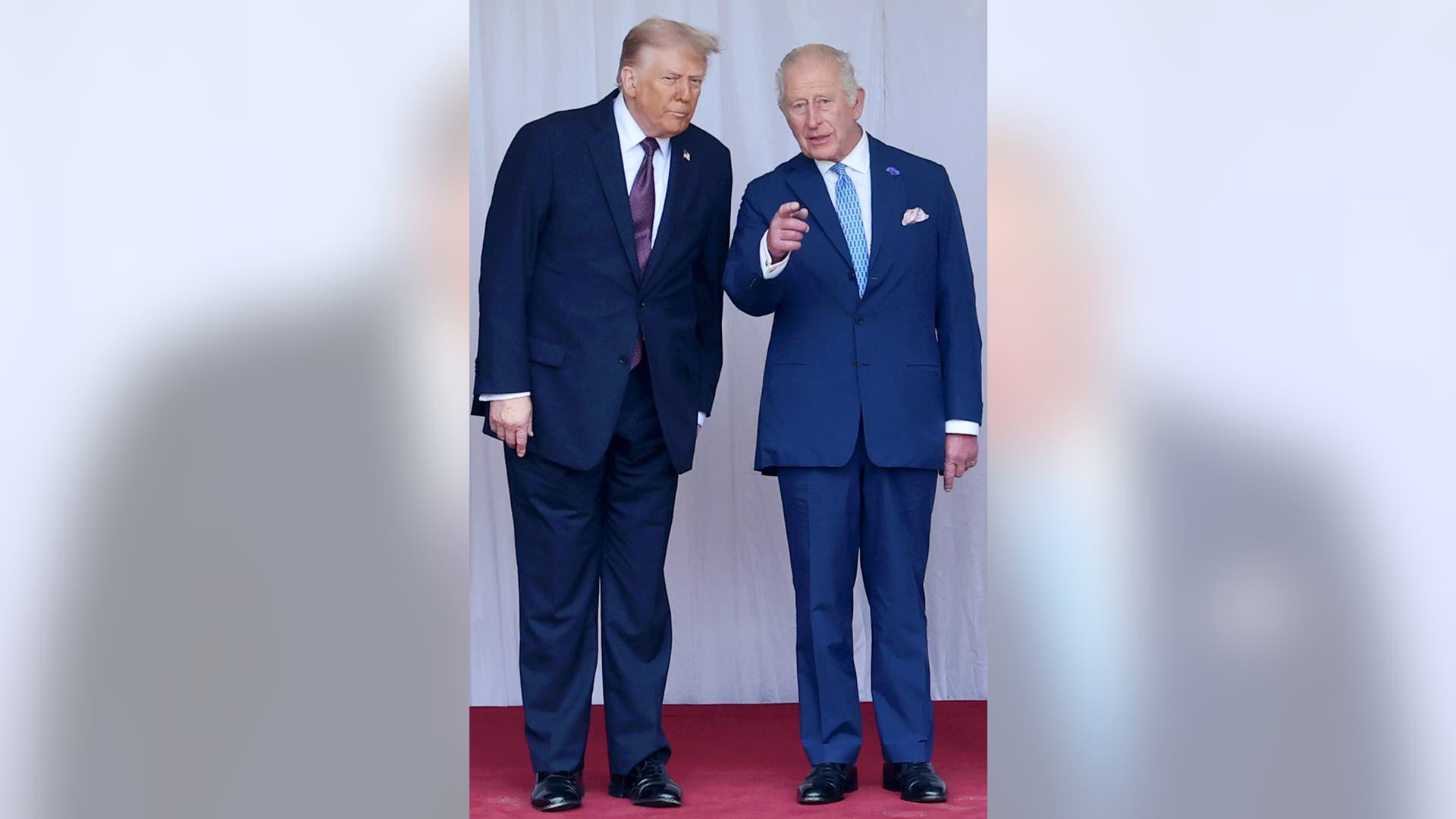 US President Donald Trump and King Charles III during a formal moment at Windsor Castle