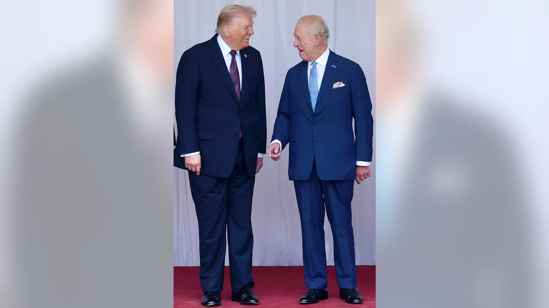 US President Donald Trump and King Charles III during a ceremonial moment at Windsor Castle.