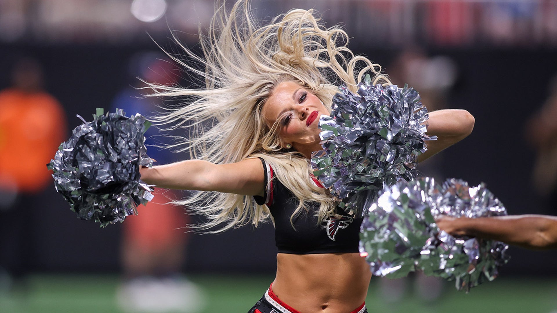 A cheerleader performing