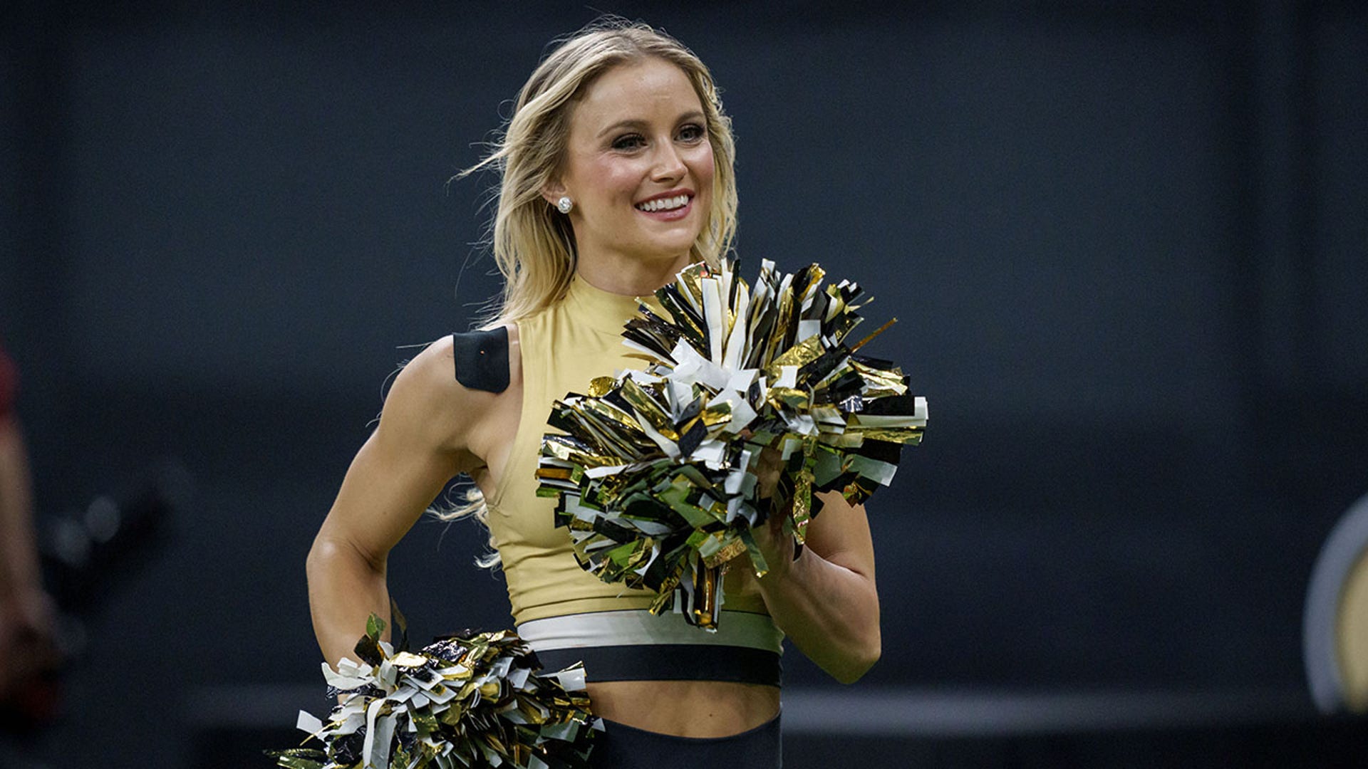 Saints cheerleader smiles