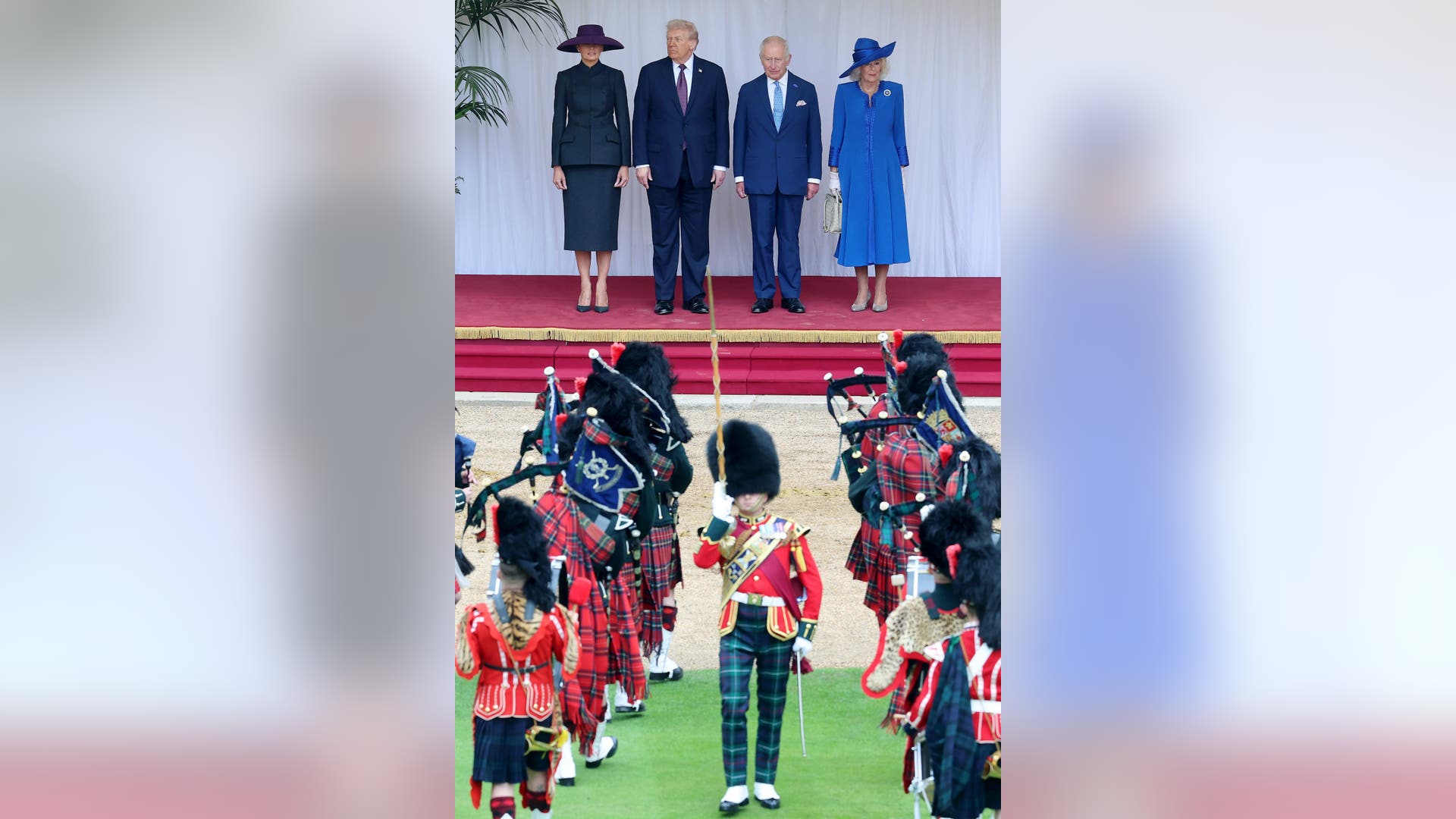 First Lady Melania Trump, President Donald Trump, King Charles III, and Queen Camilla inspect the troops during a ceremonial welcome at Windsor Castle on September 17, 2025.