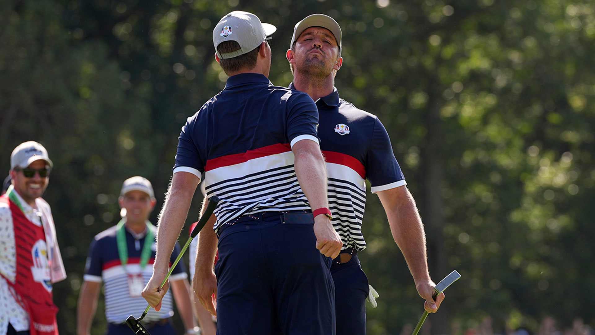 Bryson DeChambeau and Ben Griffin celebrate