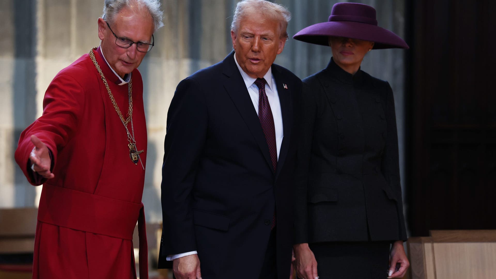 US first lady Melania Trump and President Donald Trump arrive at St. George's Chapel.