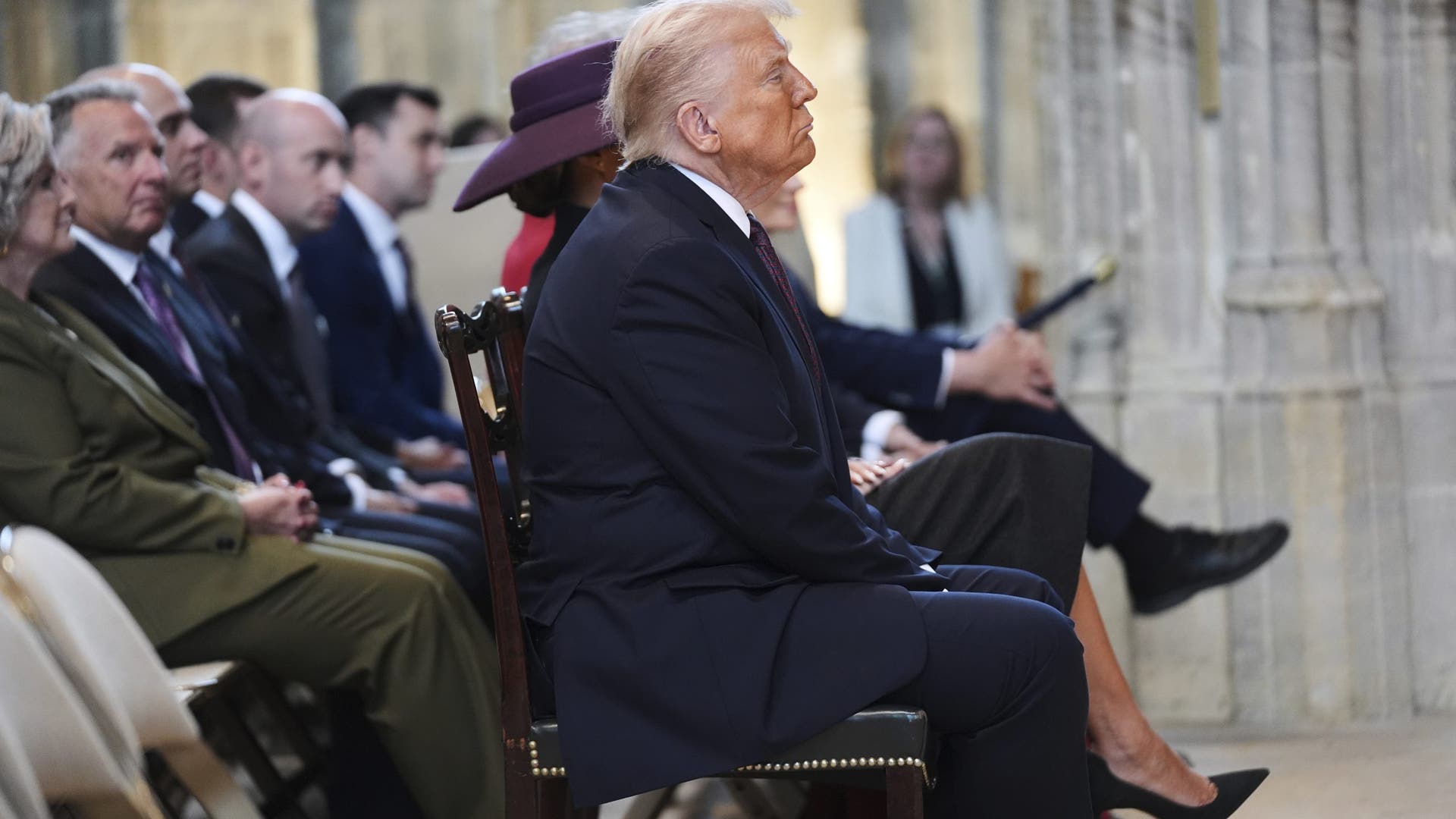 President Donald Trump and first lady Melania Trump attend an event at St. George's Chapel.