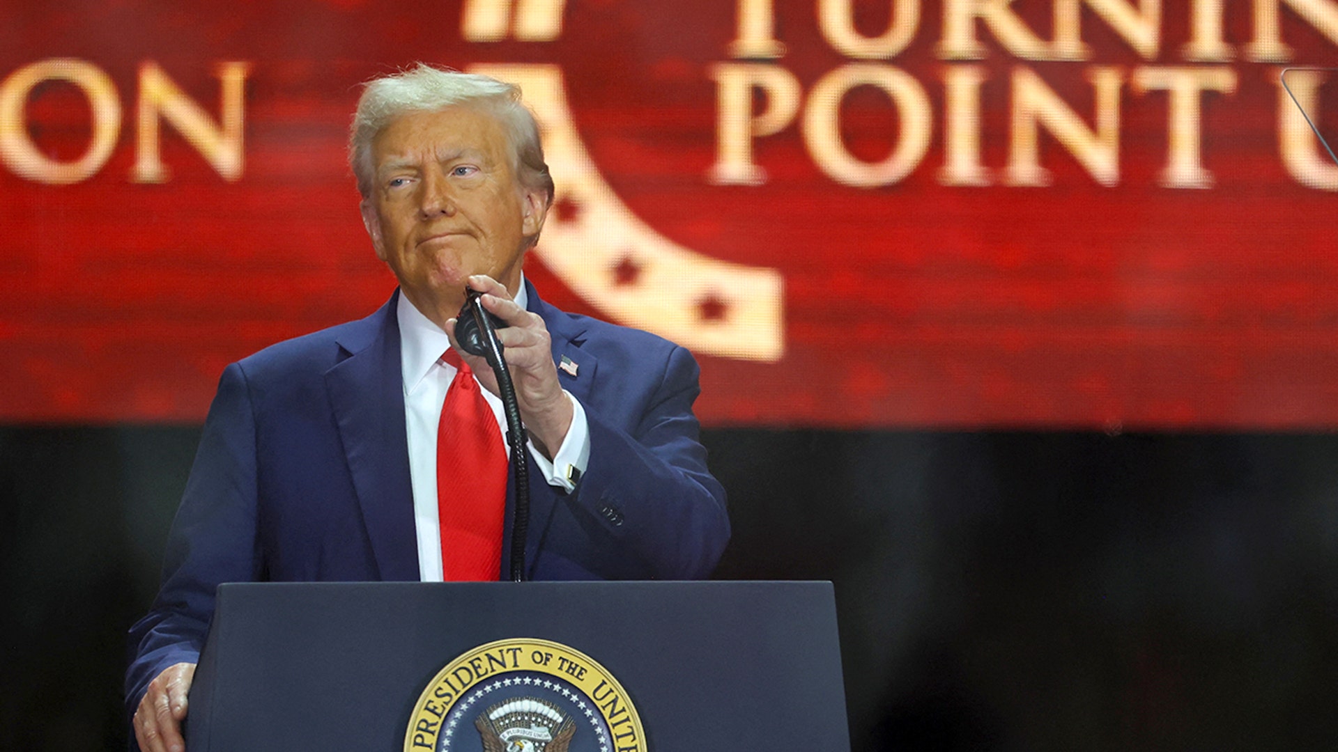 President Donald Trump speaks at Charlie Kirk Memorial in Arizona