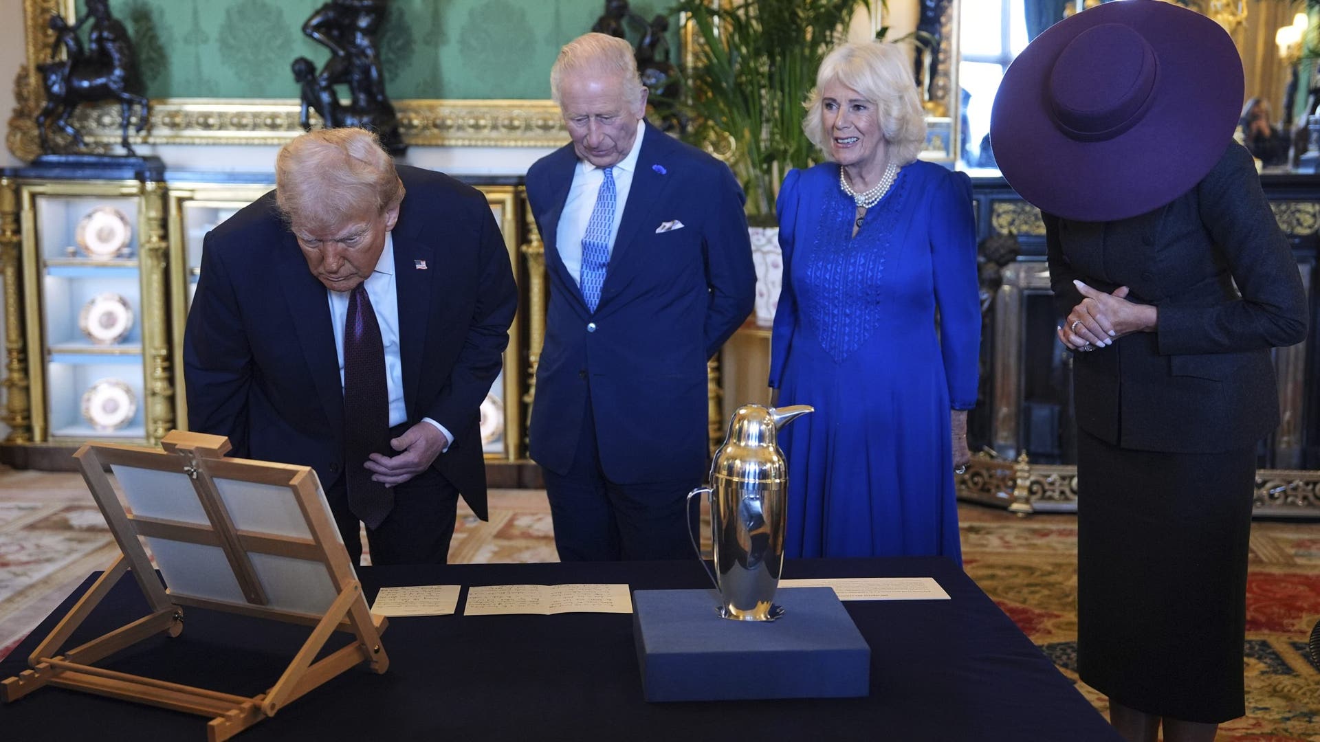 President Donald Trump, first lady Melania Trump, King Charles III, and Queen Camilla view a special display of U.S.-related items from the Royal Collection.