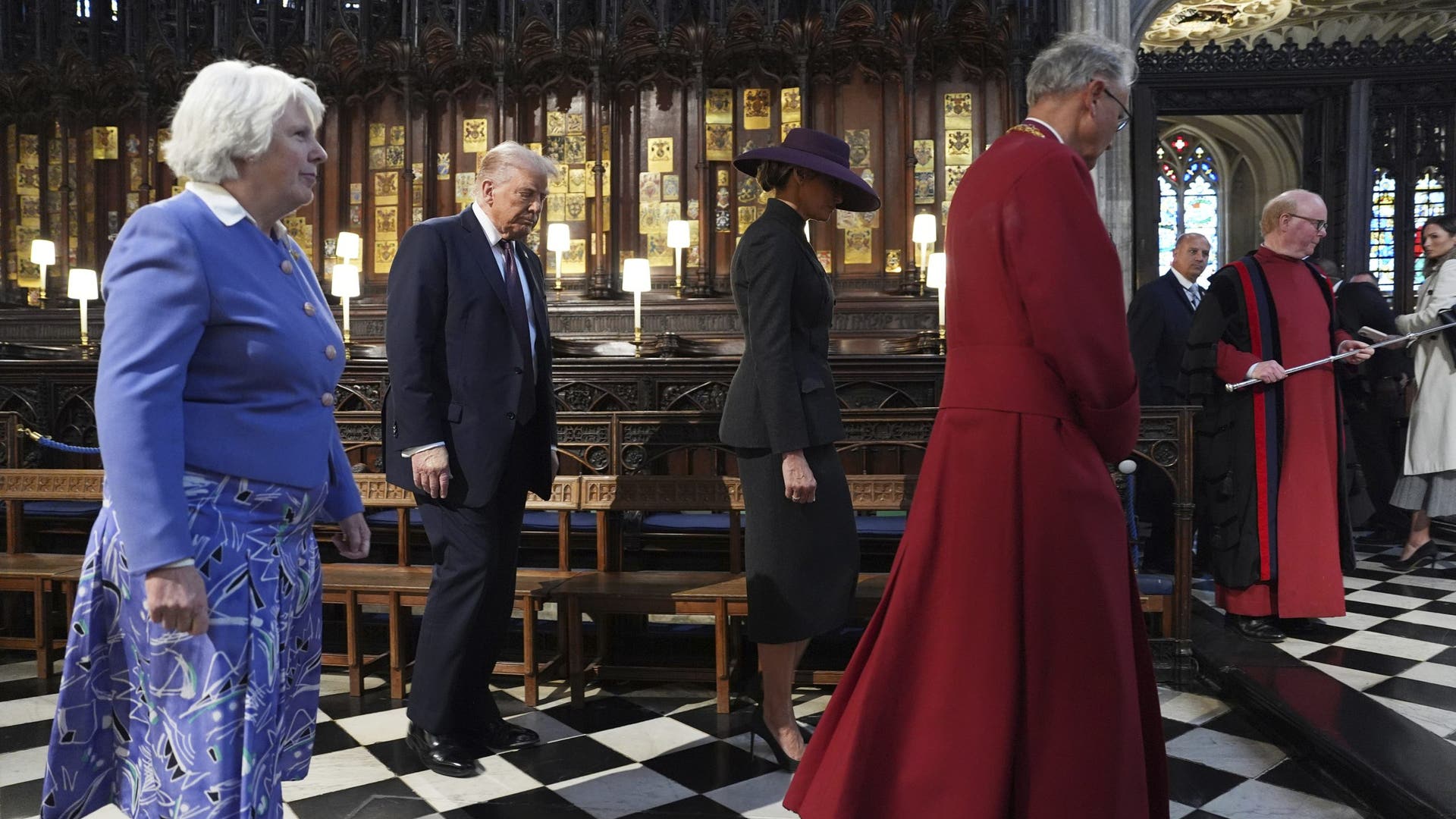 Trump and Melania walking with guides