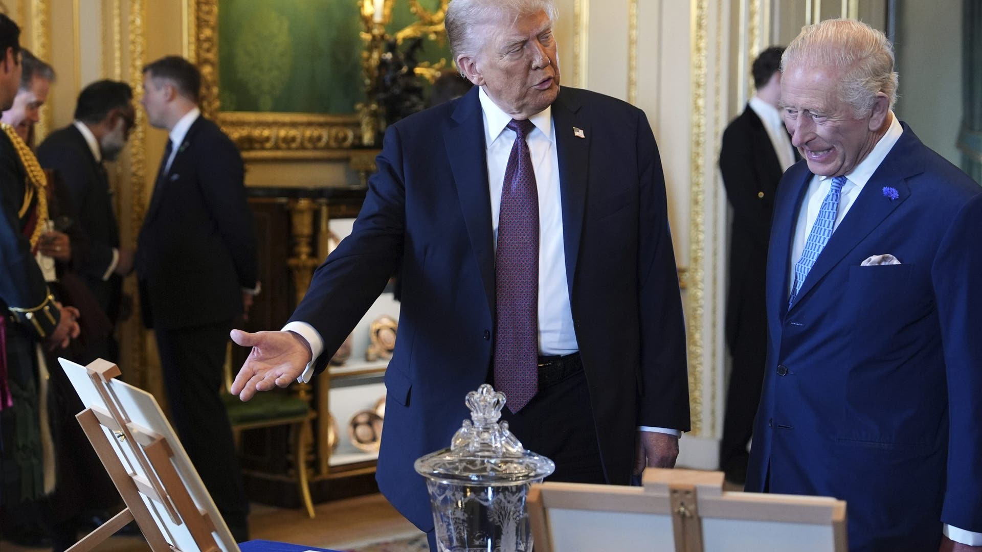 President Donald Trump and King Charles III discuss items from the Royal Collection exhibition.