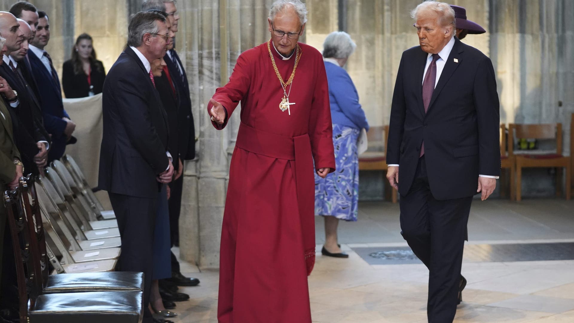 President Donald Trump and first lady Melania Trump arrive at the historic St. George's Chapel.