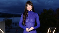 Dakota Johnson goes braless in sheer gown at Zurich Film Festival