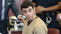 Apparent Luigi Mangione supporter claims she's 'married' to his 'AI' at courthouse rally