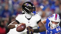Ravens' Lamar Jackson shoves fan after getting smacked in helmet following TD strike