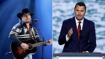 Country star leads tribute to late Charlie Kirk while waving American flag at concert - Fox News