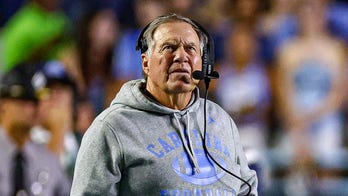 Jordon Hudson enjoys Bill Belichick's UNC debut in suite with Randy Moss as celebrities flock to Chapel Hill