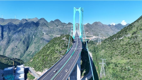World's tallest bridge cuts 2-hour mountain trip to just 2 minutes: See the jaw-dropping photos