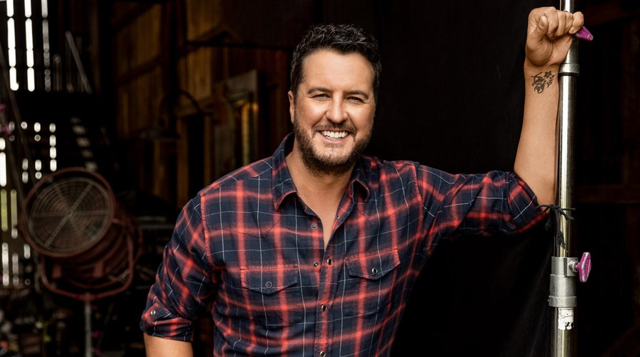 Country star Luke Bryan takes the stage and a stand for US farmers