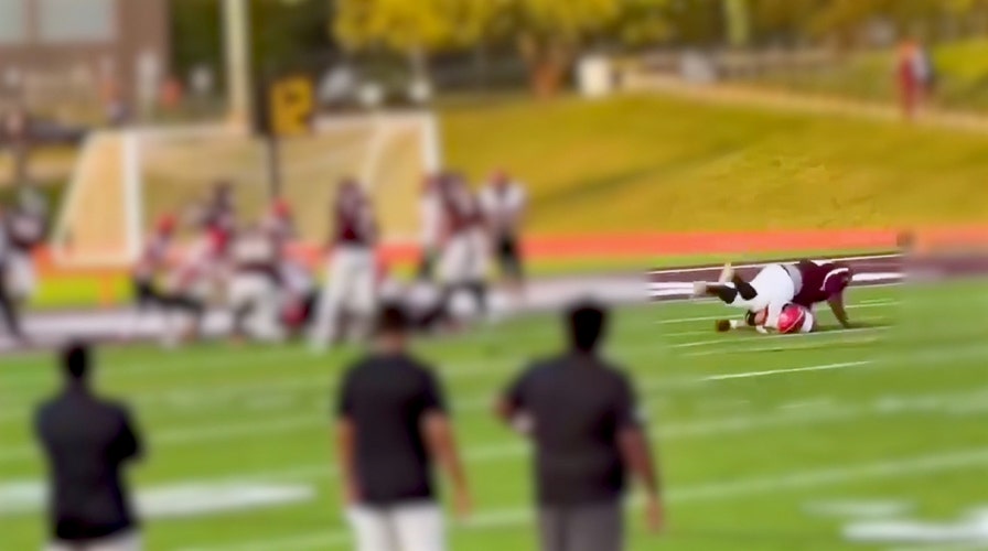 Michigan high school football player injured in vicious body slam returns to field in wheelchair