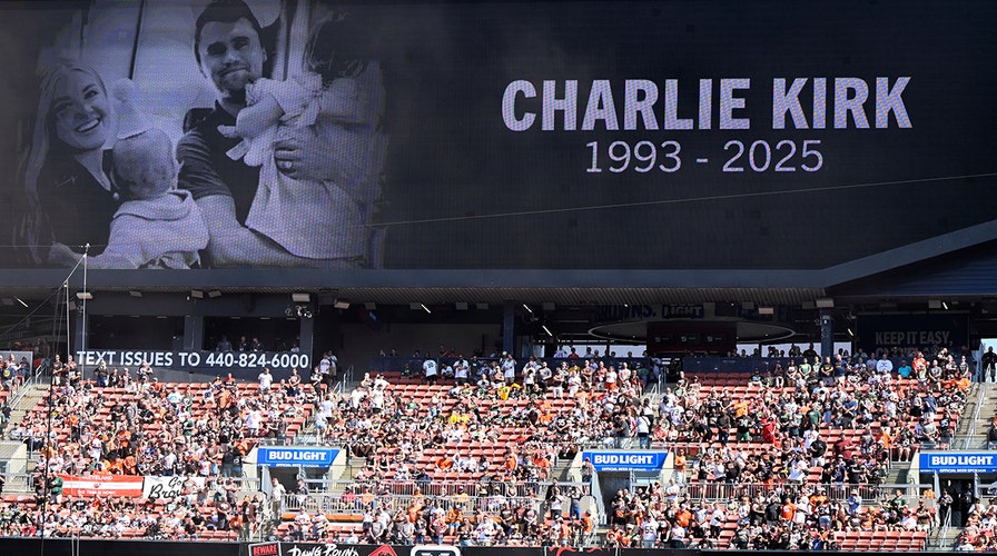 Tributes pile up at Charlie Kirk memorial outside TPUSA headquarters in Phoenix